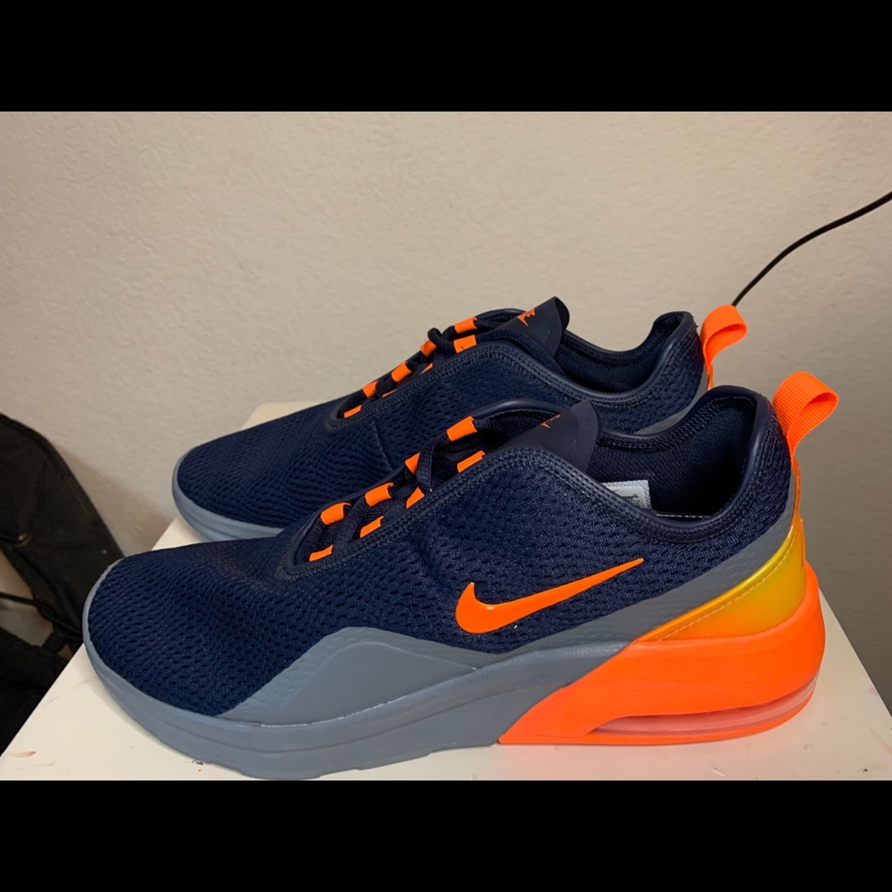 Men’s navy blue, gray, and orange Nikes